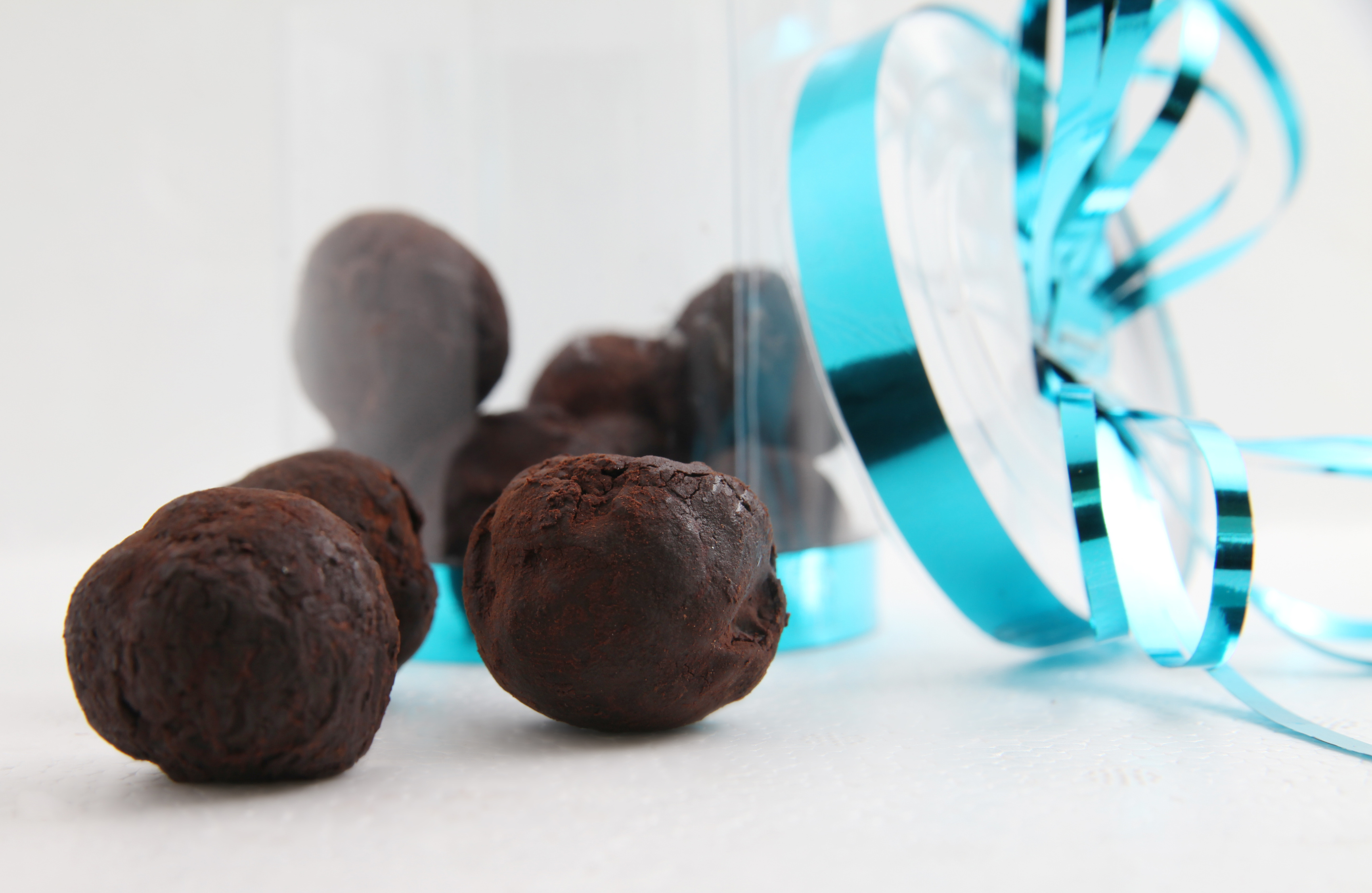 chocolate pralines cake on white background